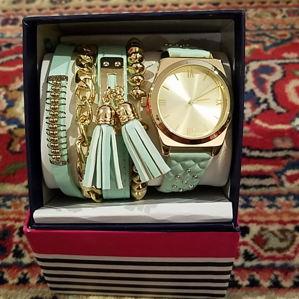 NIB gorgeous aqua colored watch and bracelets set.